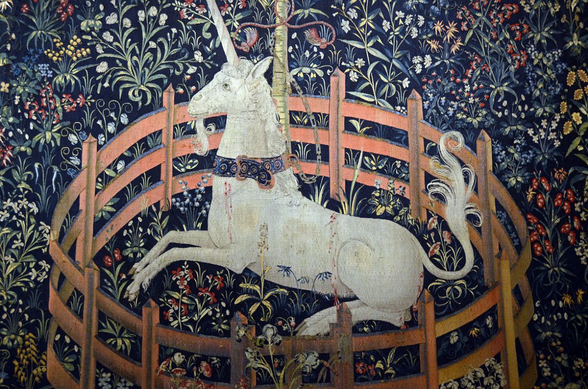 New York Cloisters 61 017 Unicorn Tapestries - The Unicorn in Captivity - the unicorn is tethered to a tree and constrained by a fence